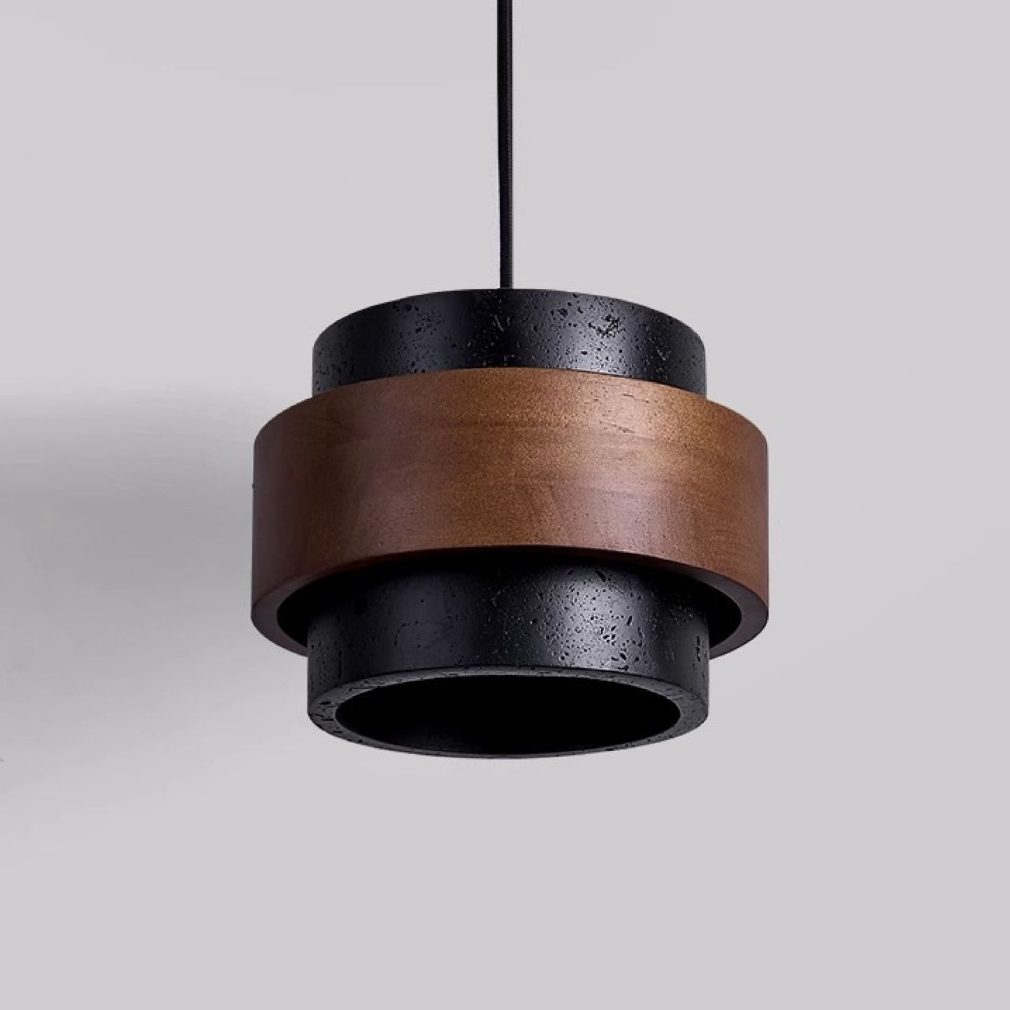 Lampada a sospensione in travertino nero elegante e raffinata