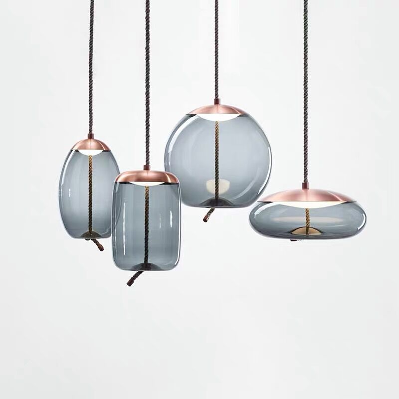 Lustre suspendu Hempoire en or rose pour une ambiance élégante et chaleureuse