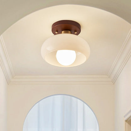Lustre au plafond crème de style Bauhaus pour une ambiance élégante et moderne