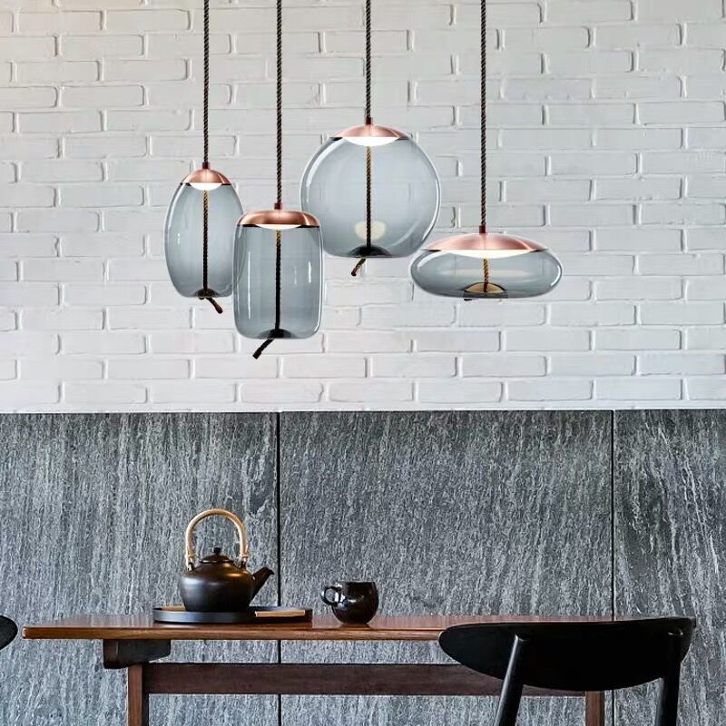 Lustre suspendu Hempoire en or rose pour une ambiance élégante et chaleureuse