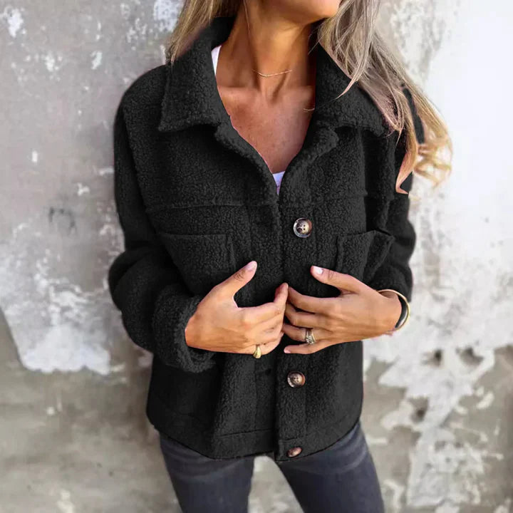 Warm knitted sweater with buttons