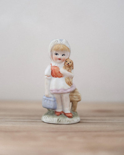 Vintage little girl figurine · porcelain girl with puppy · pastel kitsch figurine